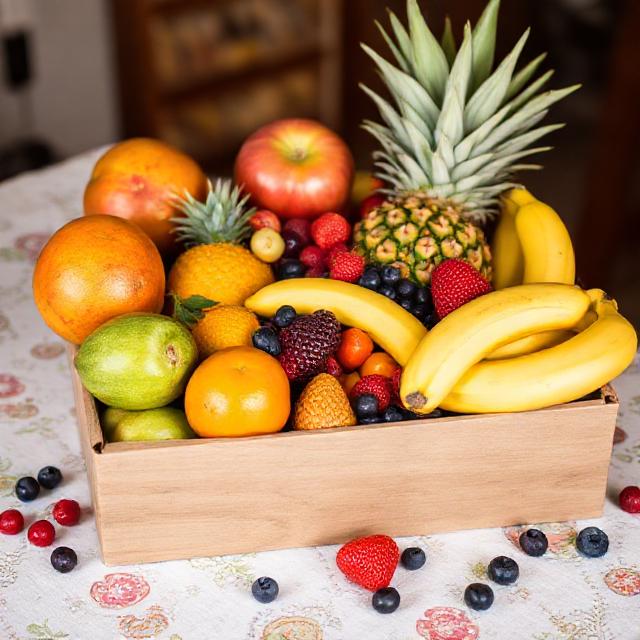 fruit mix box colorful Kenyan fruits mango pineapple banana berries